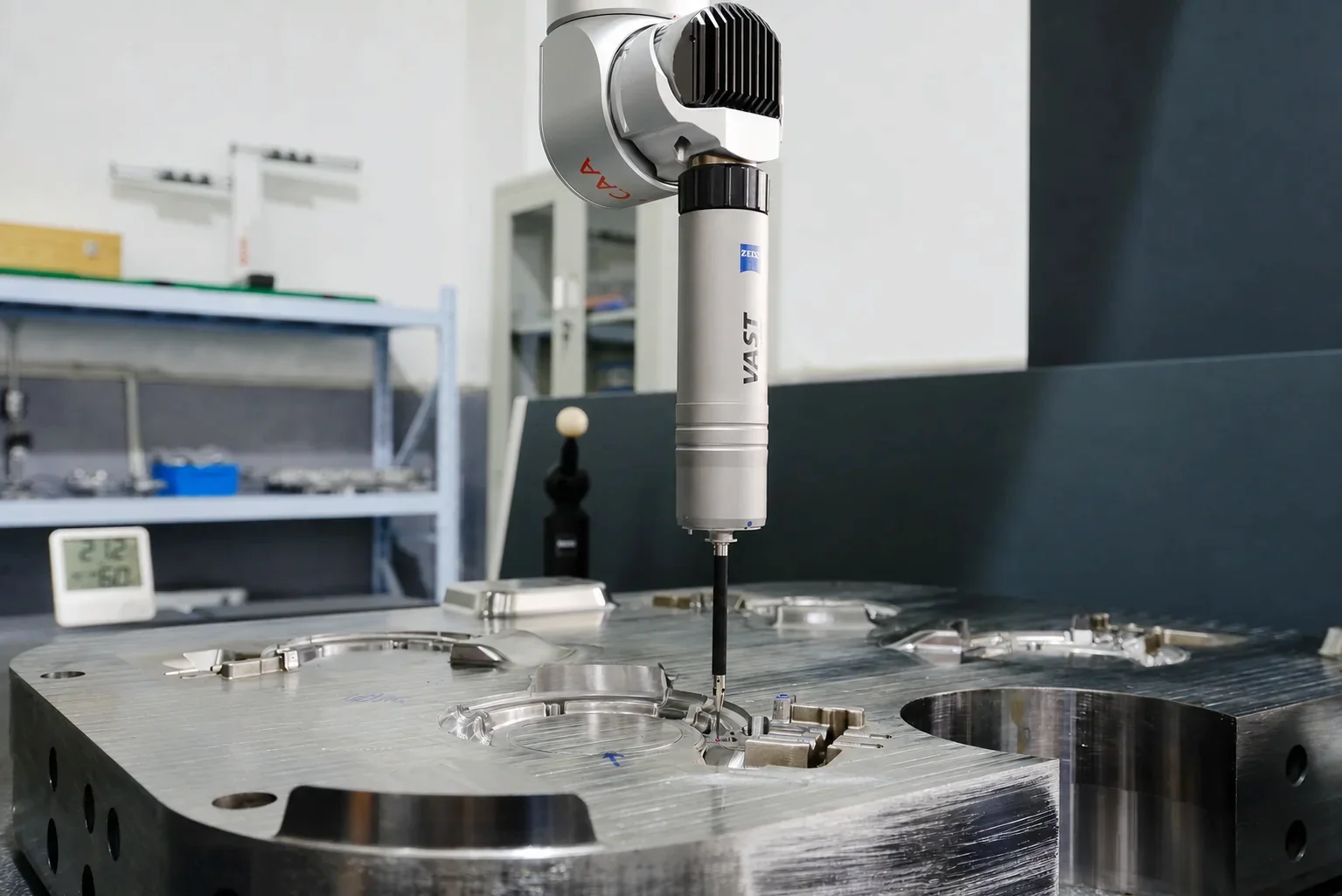 CMM probe measuring a machined tooling surface