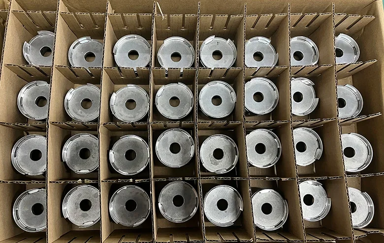 Machined components separated in transit dividers