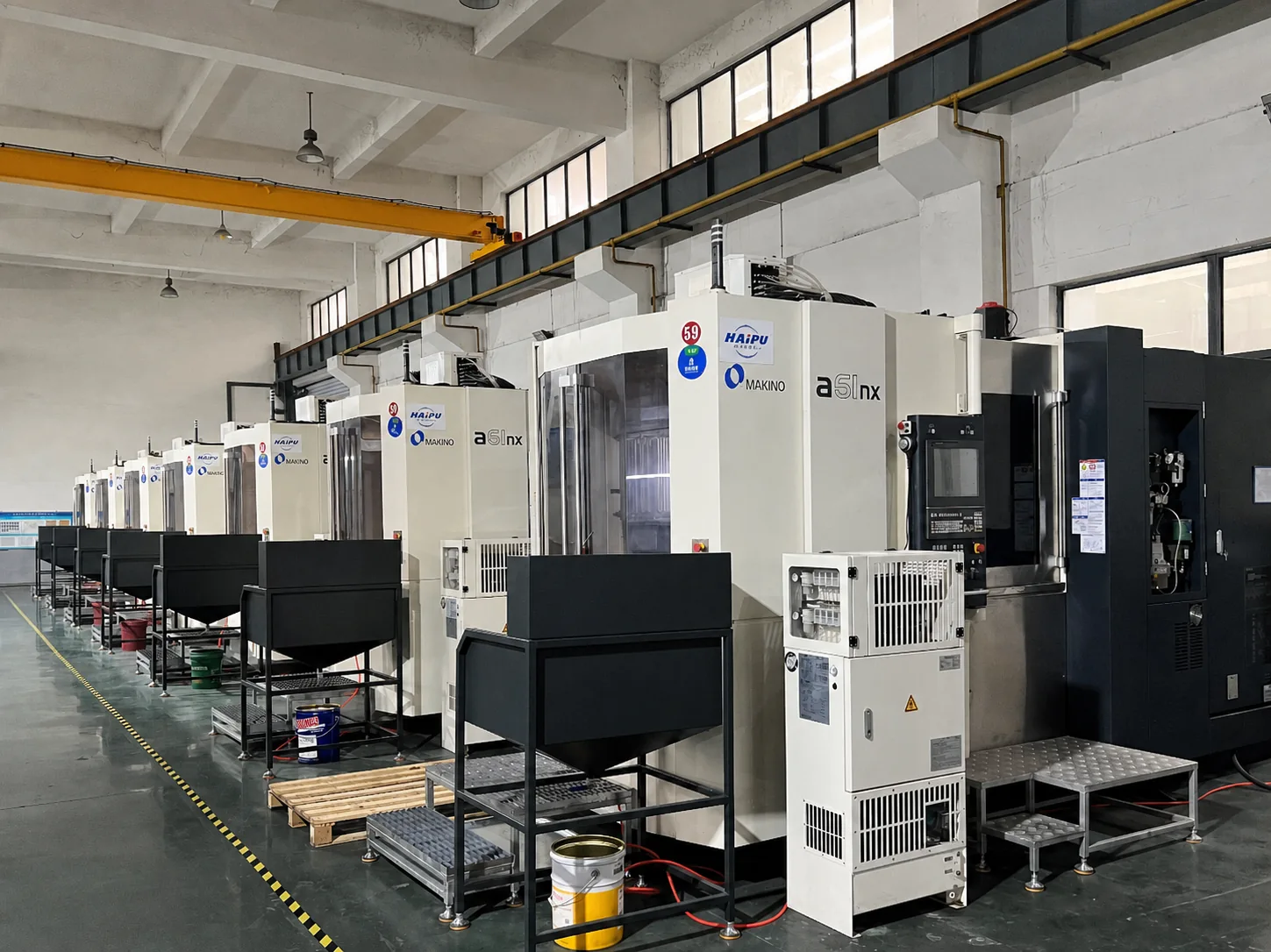Row of CNC machining equipment at a long-term strategic manufacturing base