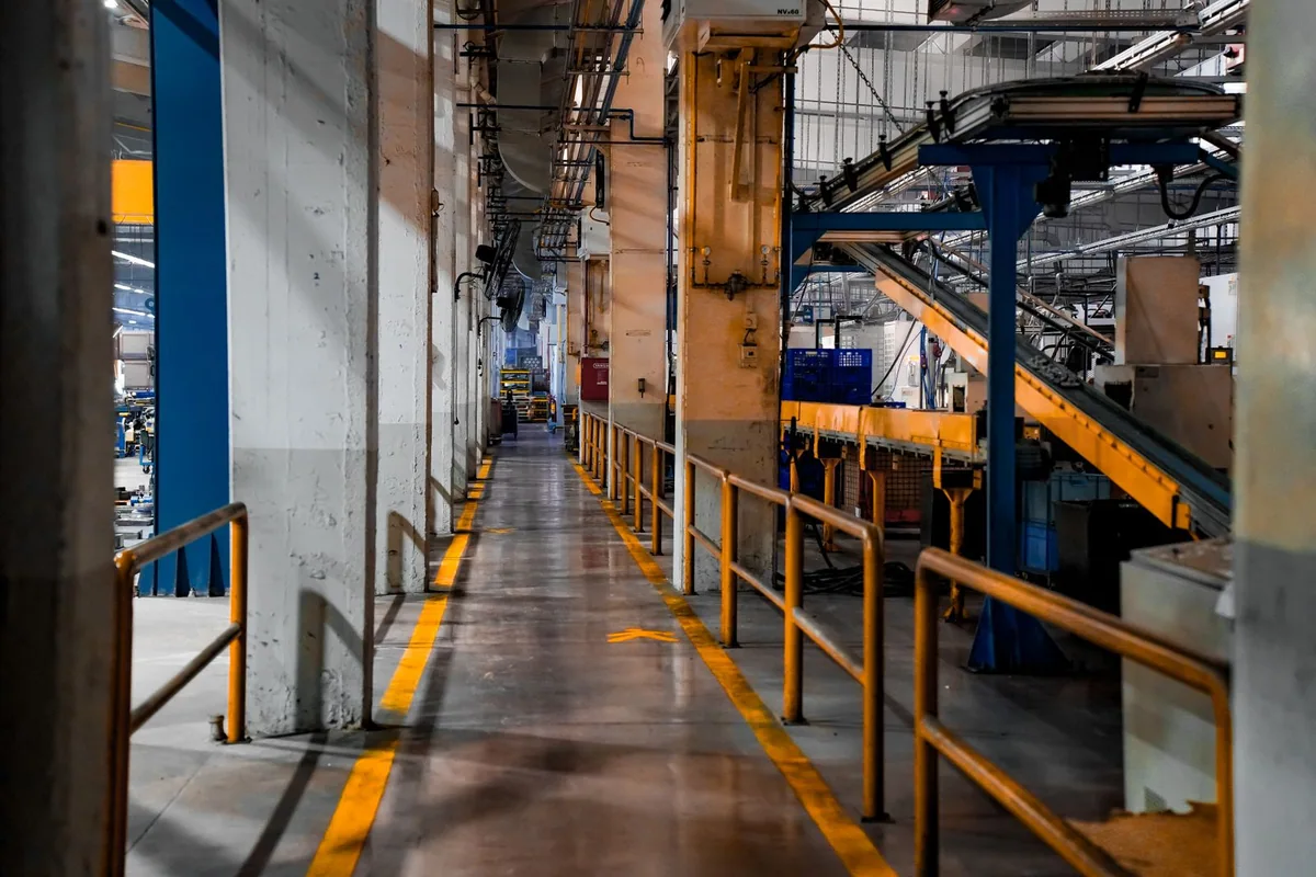 Automated conveyor and material-handling equipment in a factory
