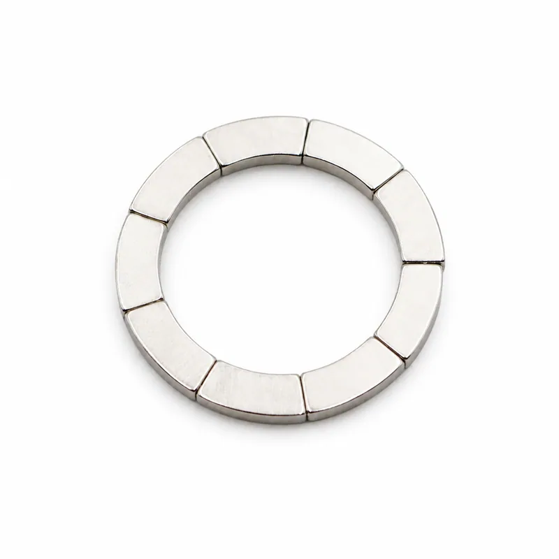 Matching NdFeB motor arc magnets assembled as a circular ring