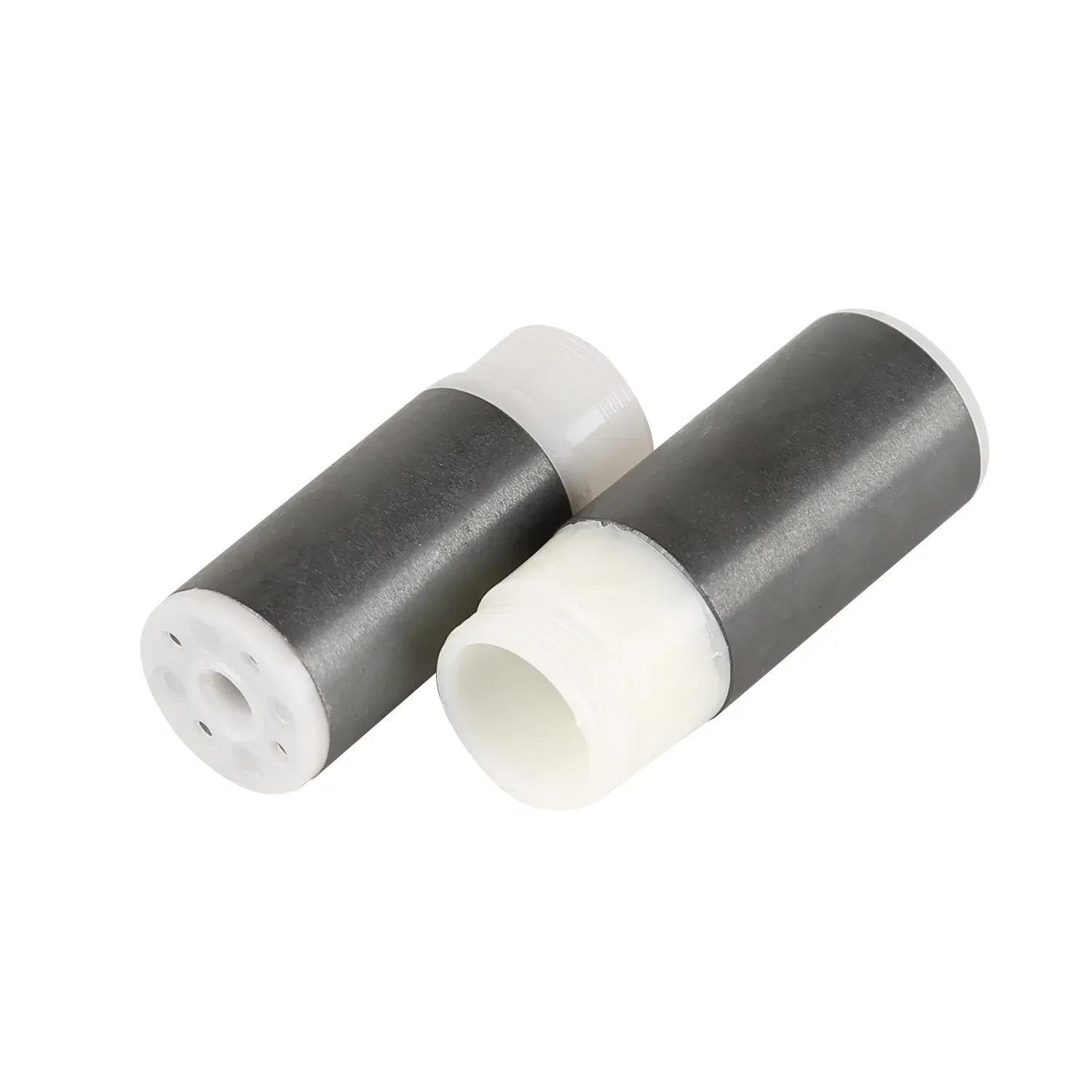 Ferrite magnet with overmoulded plastic end caps